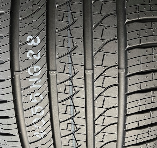 Tire cured with Spring Vents